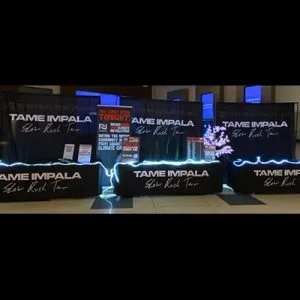 images of the Tame Impala Action Village and volunteers